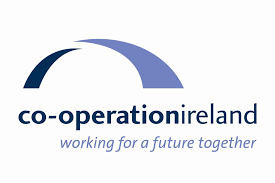 Co-operation Ireland Logo, the peace building charity led by Chairman, Dr. Christopher Moran and CEO Peter Sheridan