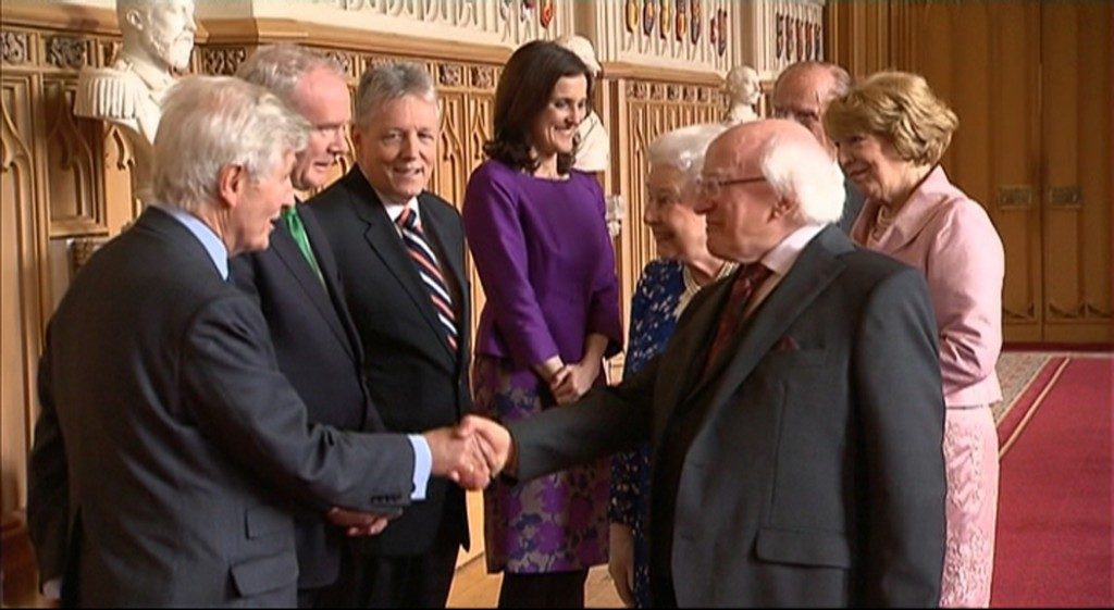 (L-R) Dr. Christopher Moran, Former Deputy First Minister Martin McGuinness, Her Majesty The Queen, His Excellency The President of Ireland Michael D. Higgins shake hands upon Irish State Visit, joined by His Royal Highness The Prince Philip, Duke of Edinburgh; Mrs. Sabina Higgins; and Secretary of State for Norther Ireland Theresa Villiers