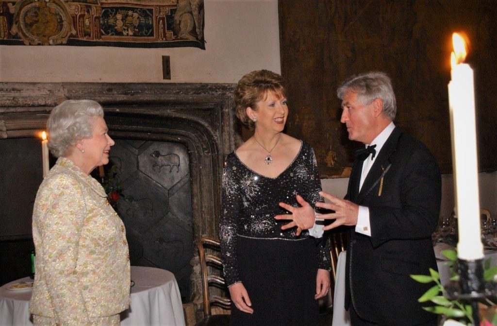 Joint Patrons of Co-operation Ireland Her Majesty The Queen and the President of Ireland, Her Excellency Mary McAleese speak with Dr. Christopher Moran, Chairman of Co-operation Ireland on the 25th anniversary of Co-operation Ireland in the Great Hall of Crosby Moran Hall, in 2005