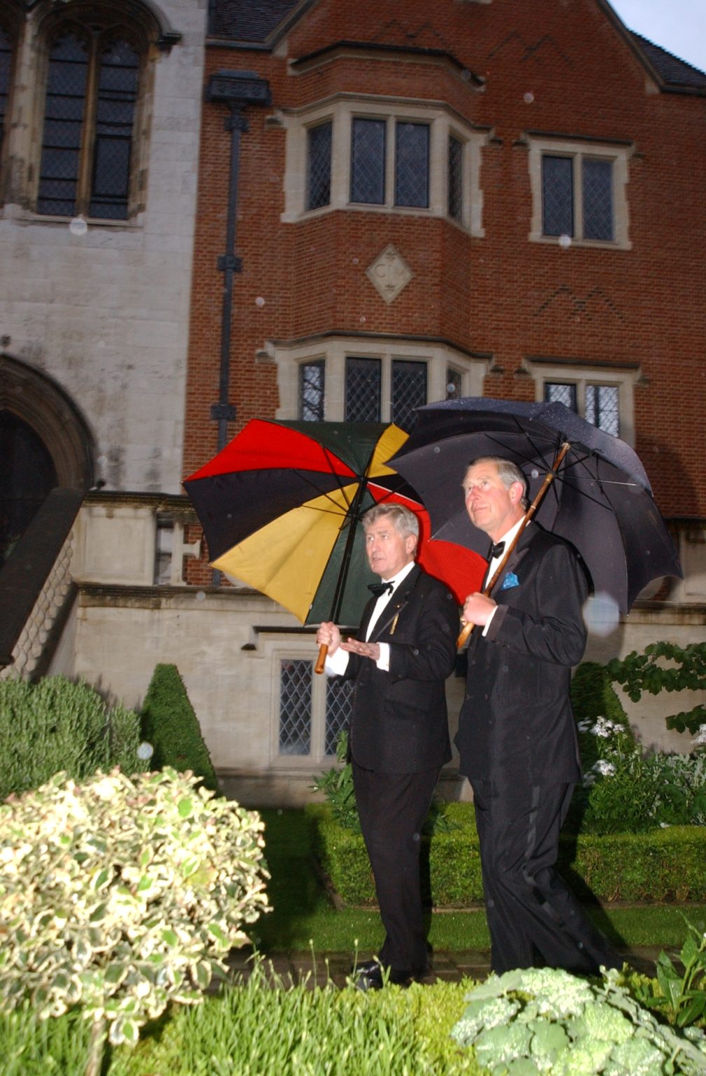 Dr. Christopher Moran congratulates Their Majesties King Charles III